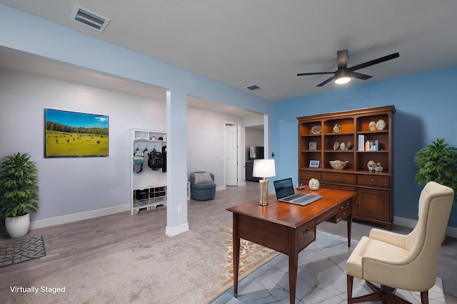 10299 SW Captiva Dr, Port Saint Lucie, FL 34987 - office with ceiling fan, baseboards, and light colored carpet
