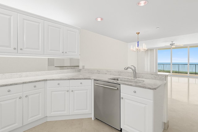 800 Ocean Dr Unit 204, Juno Beach, FL 33408 - kitchen featuring dishwasher, a sink, a chandelier, a water view, and white cabinetry