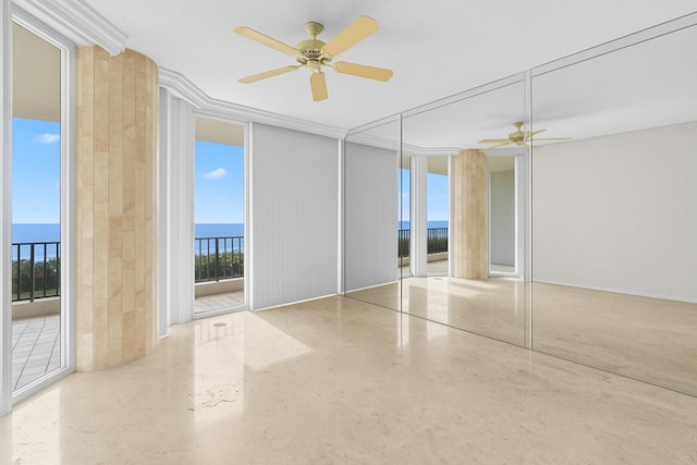 800 Ocean Dr Unit 204, Juno Beach, FL 33408 - unfurnished bedroom featuring expansive windows, access to outside, a water view, and a ceiling fan