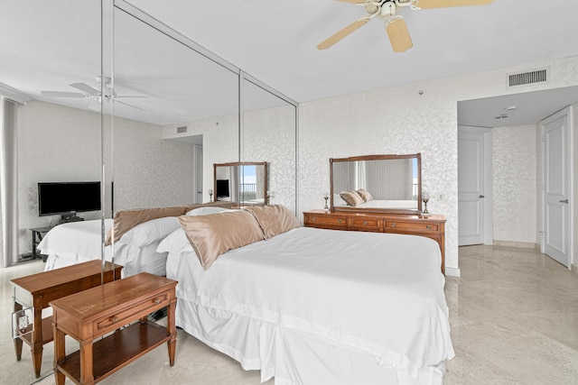 800 Ocean Dr Unit 204, Juno Beach, FL 33408 - bedroom featuring ceiling fan and a textured wall