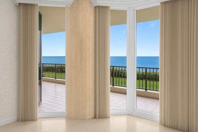 800 Ocean Dr Unit 204, Juno Beach, FL 33408 - spare room featuring a water view and plenty of natural light