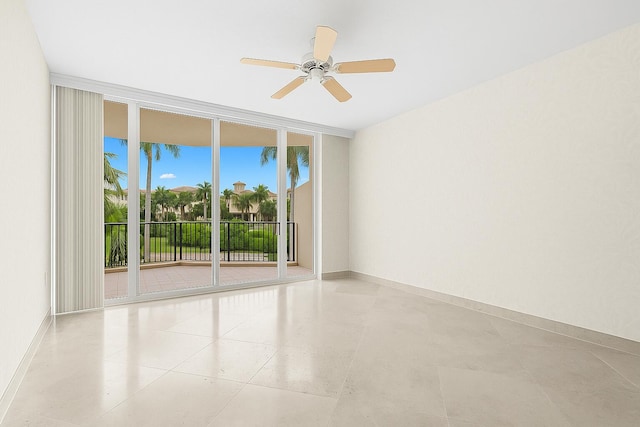 800 Ocean Dr Unit 204, Juno Beach, FL 33408 - unfurnished room with expansive windows, a ceiling fan, and baseboards