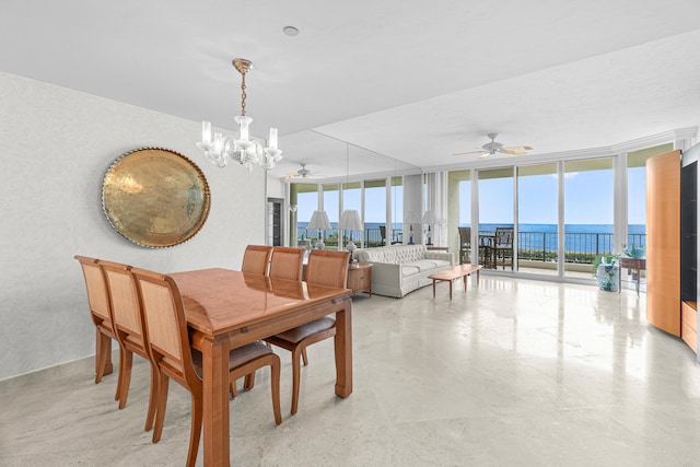 800 Ocean Dr Unit 204, Juno Beach, FL 33408 - dining space with a wall of windows, a ceiling fan, a chandelier, and a water view