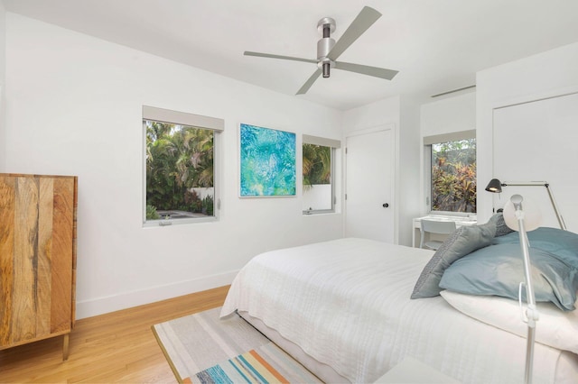 711 Ardmore Rd, West Palm Beach, FL 33401 - bedroom with light wood-type flooring, baseboards, and ceiling fan