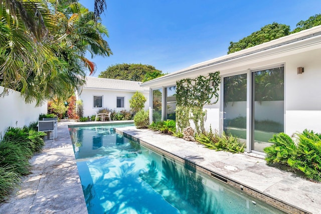 711 Ardmore Rd, West Palm Beach, FL 33401 - swimming pool featuring a patio