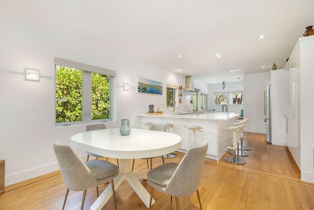 711 Ardmore Rd, West Palm Beach, FL 33401 - dining room featuring baseboards, light wood-type flooring, recessed lighting, and a ceiling fan