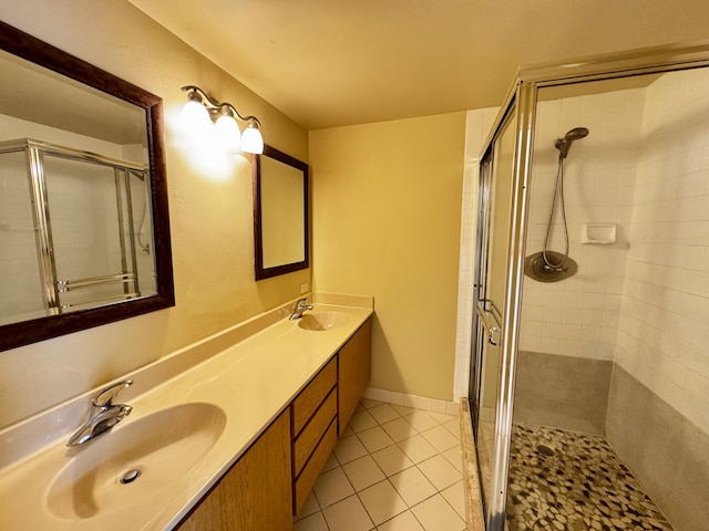 6006 60th Way, West Palm Beach, FL 33409 - full bath with a shower stall, tile patterned flooring, and double vanity