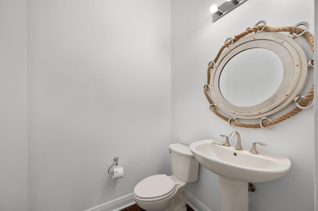 18006 SW Cosenza Way, Port Saint Lucie, FL 34987 - half bathroom featuring baseboards and toilet