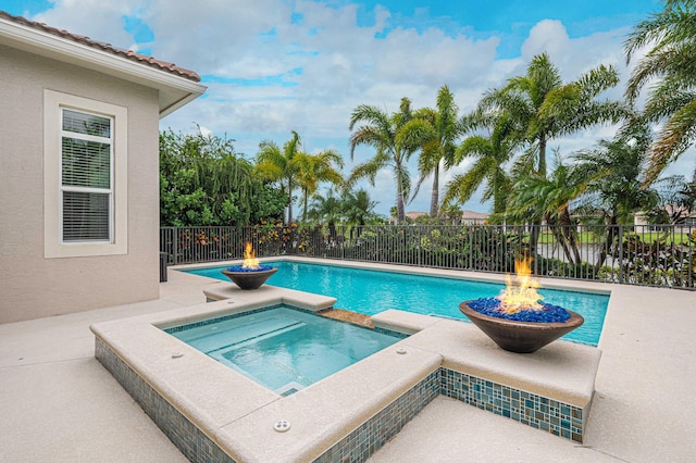 18006 SW Cosenza Way, Port Saint Lucie, FL 34987 - view of pool featuring an in-ground hot tub, a fenced backyard, and a patio