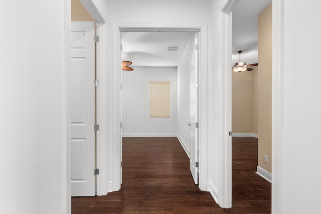 18006 SW Cosenza Way, Port Saint Lucie, FL 34987 - hallway with dark wood-style floors and baseboards