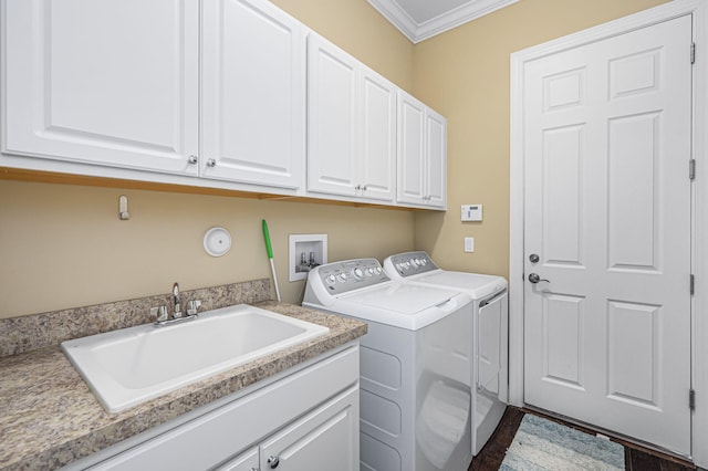 18006 SW Cosenza Way, Port Saint Lucie, FL 34987 - laundry room featuring washer and clothes dryer, crown molding, cabinet space, and dark wood-type flooring