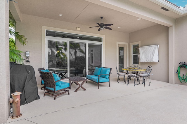 18006 SW Cosenza Way, Port Saint Lucie, FL 34987 - view of patio / terrace with ceiling fan and outdoor dining space