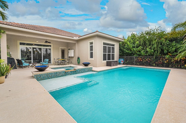 18006 SW Cosenza Way, Port Saint Lucie, FL 34987 - view of pool with a patio area, ceiling fan, an outdoor hangout area, and a pool with connected hot tub