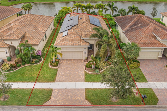 18006 SW Cosenza Way, Port Saint Lucie, FL 34987 - aerial view of property and surrounding area featuring a large body of water and property boundaries highlighted