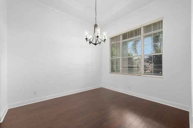18006 SW Cosenza Way, Port Saint Lucie, FL 34987 - spare room featuring a chandelier, dark wood-type flooring, baseboards, and crown molding
