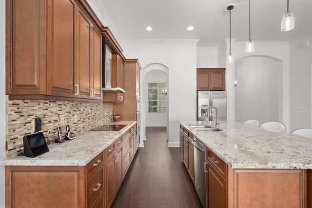 18006 SW Cosenza Way, Port Saint Lucie, FL 34987 - kitchen with a sink, appliances with stainless steel finishes, arched walkways, a kitchen island with sink, and backsplash