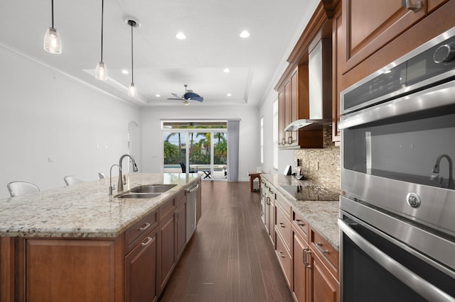 18006 SW Cosenza Way, Port Saint Lucie, FL 34987 - kitchen featuring a sink, tasteful backsplash, ceiling fan, stainless steel appliances, and light stone countertops