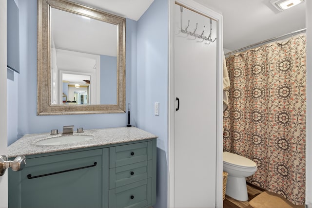 1508 15th Ter, Palm Beach Gardens, FL 33418 - bathroom featuring vanity and toilet