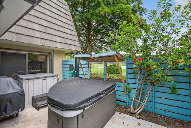 1508 15th Ter, Palm Beach Gardens, FL 33418 - deck with a hot tub, grilling area, and a patio area