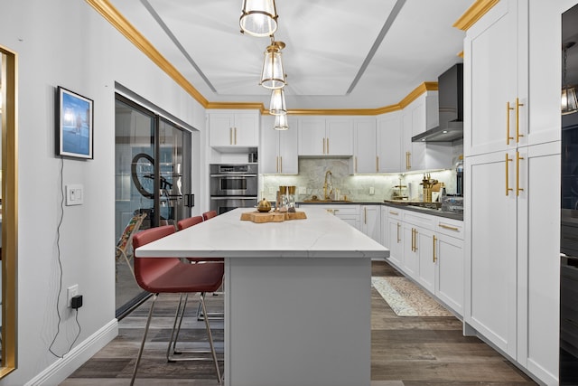 1508 15th Ter, Palm Beach Gardens, FL 33418 - kitchen with wall chimney exhaust hood, appliances with stainless steel finishes, decorative backsplash, and dark wood-style flooring