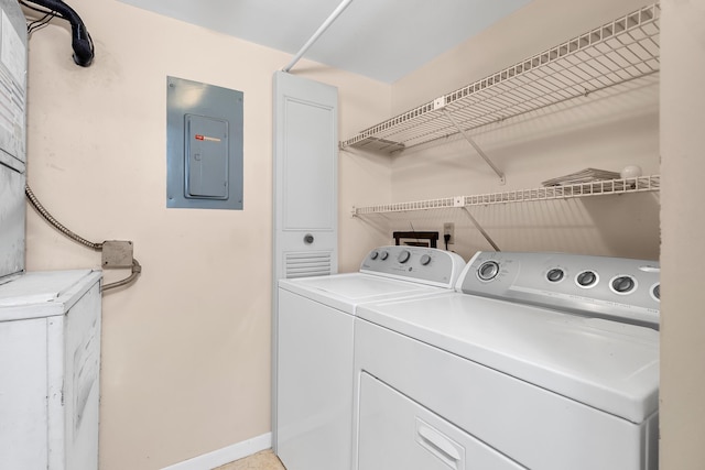 531 Shady Pine Way Unit A 2, Greenacres, FL 33415 - washroom with electric panel, independent washer and dryer, and baseboards