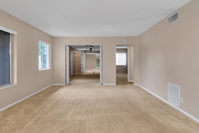531 Shady Pine Way Unit A 2, Greenacres, FL 33415 - empty room featuring light colored carpet and baseboards