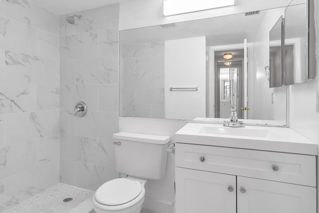 531 Shady Pine Way Unit A 2, Greenacres, FL 33415 - bathroom with tiled shower, toilet, and vanity