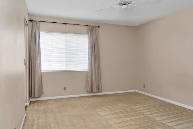 531 Shady Pine Way Unit A 2, Greenacres, FL 33415 - carpeted spare room featuring ceiling fan, baseboards, and a textured ceiling
