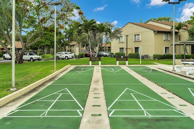 531 Shady Pine Way Unit A 2, Greenacres, FL 33415 - surrounding community with a yard and shuffleboard