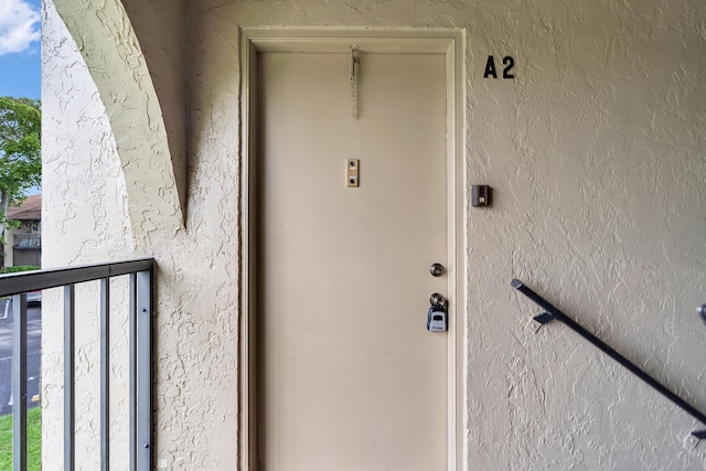 531 Shady Pine Way Unit A 2, Greenacres, FL 33415 - entrance to property with stucco siding