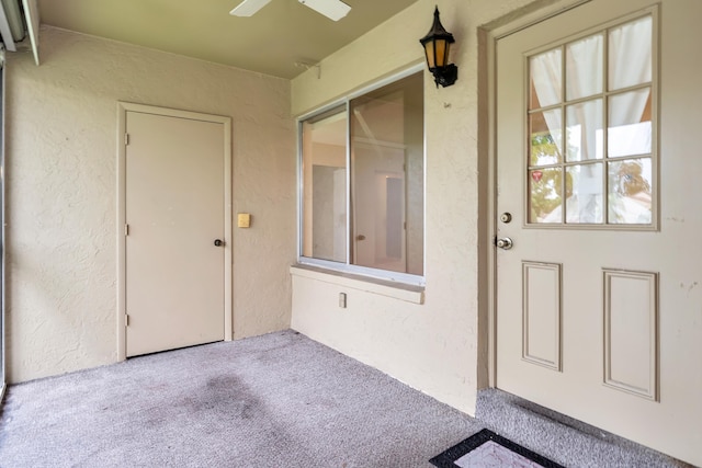 531 Shady Pine Way Unit A 2, Greenacres, FL 33415 - property entrance with a ceiling fan and stucco siding