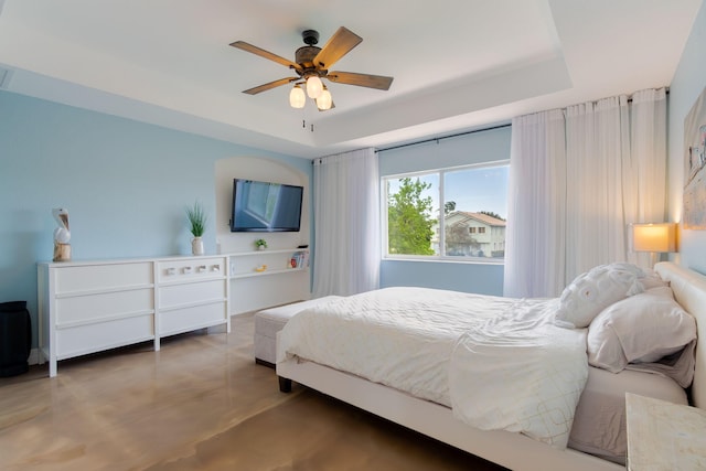 1026 Center Stone Ln, Riviera Beach, FL 33404 - bedroom featuring a raised ceiling and a ceiling fan