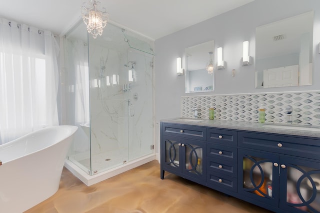 1026 Center Stone Ln, Riviera Beach, FL 33404 - full bathroom featuring a marble finish shower, a freestanding tub, tasteful backsplash, and double vanity