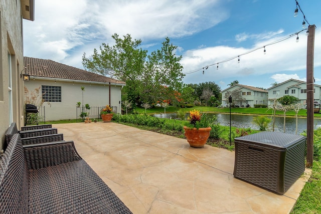 1026 Center Stone Ln, Riviera Beach, FL 33404 - view of patio featuring a water view