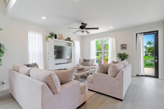 1026 Center Stone Ln, Riviera Beach, FL 33404 - living area featuring light wood-style floors, a ceiling fan, and recessed lighting