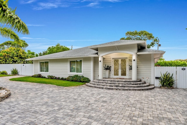 936 Upland Rd, West Palm Beach, FL 33401 - view of front of house with a gate