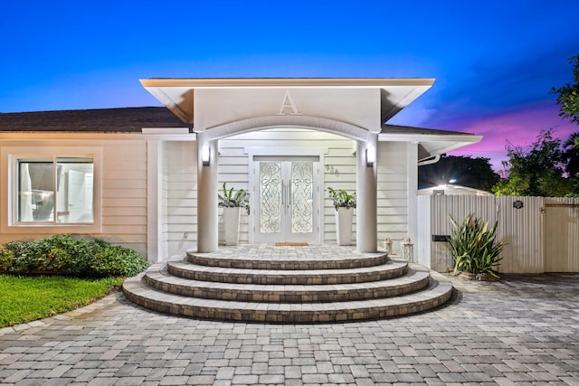 936 Upland Rd, West Palm Beach, FL 33401 - view of exterior entry at dusk