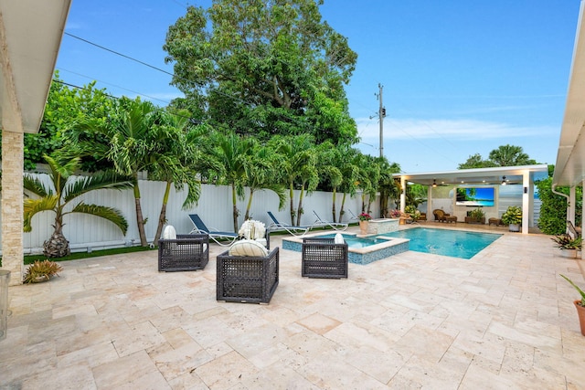 936 Upland Rd, West Palm Beach, FL 33401 - view of pool with an in-ground hot tub, a fenced backyard, and a patio