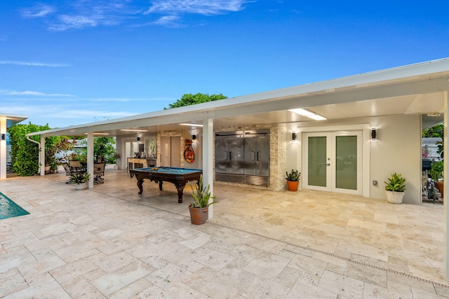 936 Upland Rd, West Palm Beach, FL 33401 - view of patio / terrace with french doors