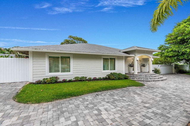 936 Upland Rd, West Palm Beach, FL 33401 - ranch-style home with decorative driveway