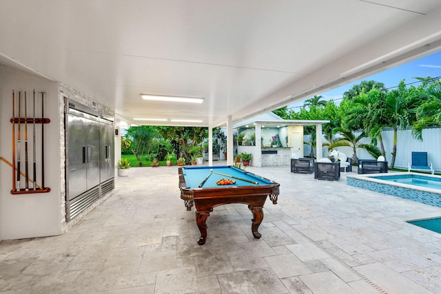 936 Upland Rd, West Palm Beach, FL 33401 - fenced backyard with a patio and an in-ground hot tub