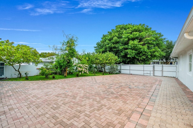 936 Upland Rd, West Palm Beach, FL 33401 - fenced backyard featuring a patio