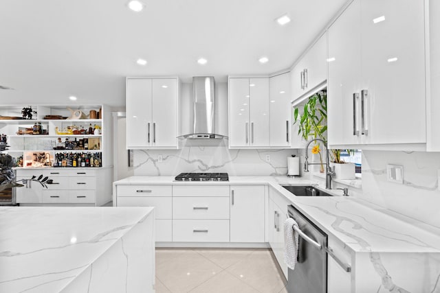 936 Upland Rd, West Palm Beach, FL 33401 - kitchen with wall chimney exhaust hood, dishwasher, modern cabinets, gas cooktop, and a sink