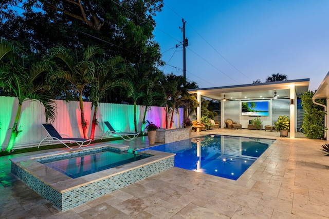 936 Upland Rd, West Palm Beach, FL 33401 - view of swimming pool featuring an in-ground hot tub, a patio area, and a fenced backyard