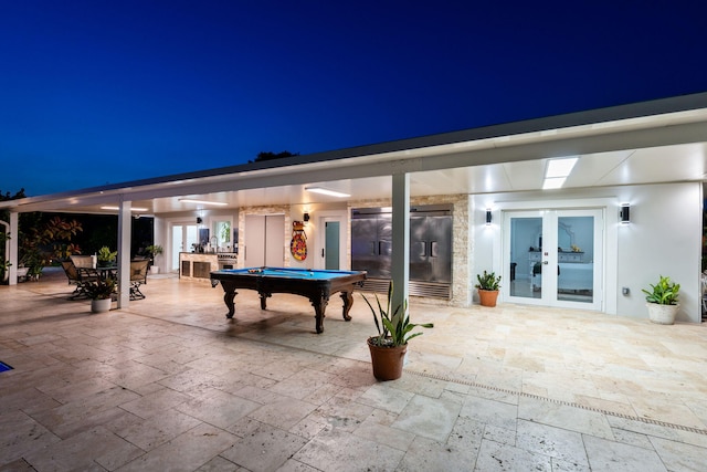 936 Upland Rd, West Palm Beach, FL 33401 - view of patio featuring french doors and outdoor dining space