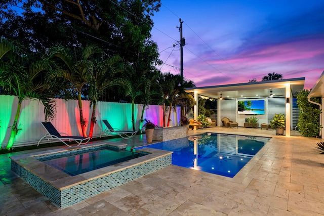 936 Upland Rd, West Palm Beach, FL 33401 - view of swimming pool with an in-ground hot tub, a patio area, and a fenced backyard