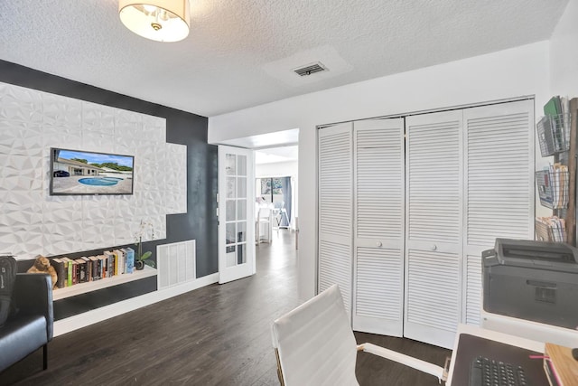 3985 NW 73rd Way, Coral Springs, FL 33065 - office space with wood finished floors, a textured ceiling, and baseboards
