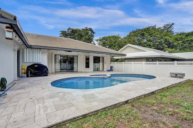 3985 NW 73rd Way, Coral Springs, FL 33065 - view of swimming pool featuring a patio area, an in-ground hot tub, and a grill