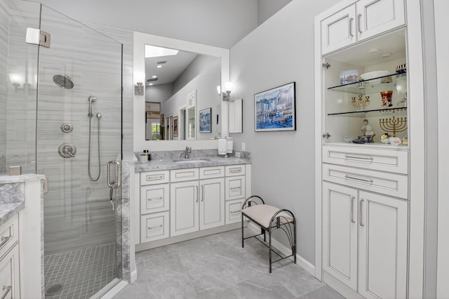 2373 NW 25th Way, Boca Raton, FL 33434 - bathroom featuring vanity, a stall shower, and marble finish floors