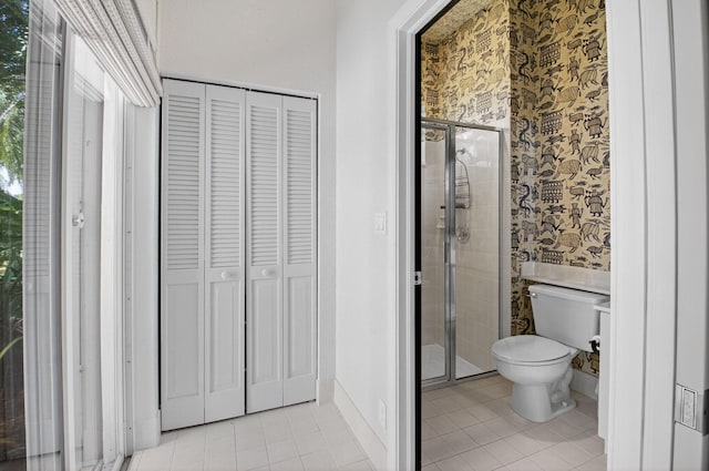 2373 NW 25th Way, Boca Raton, FL 33434 - full bathroom with a closet, tile patterned flooring, wallpapered walls, and a stall shower